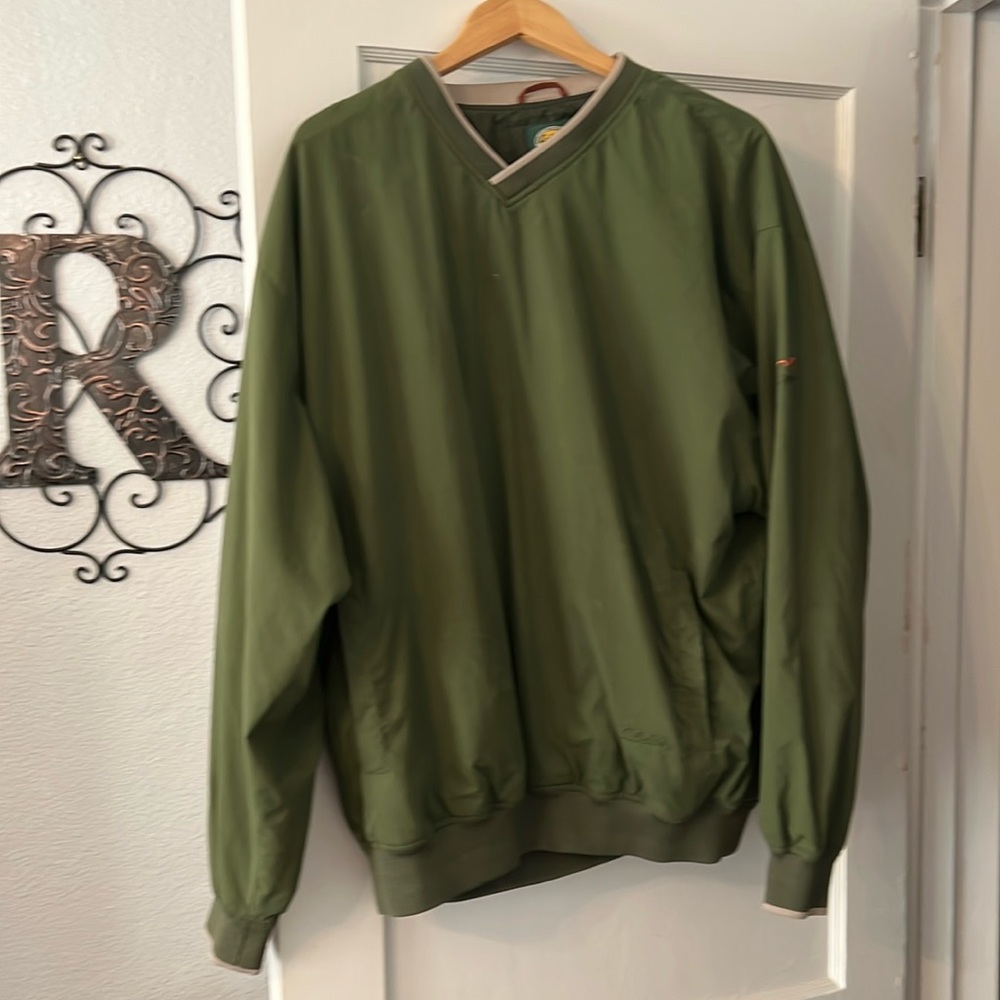 Cabela’s rain and wind proof pull over jacket.